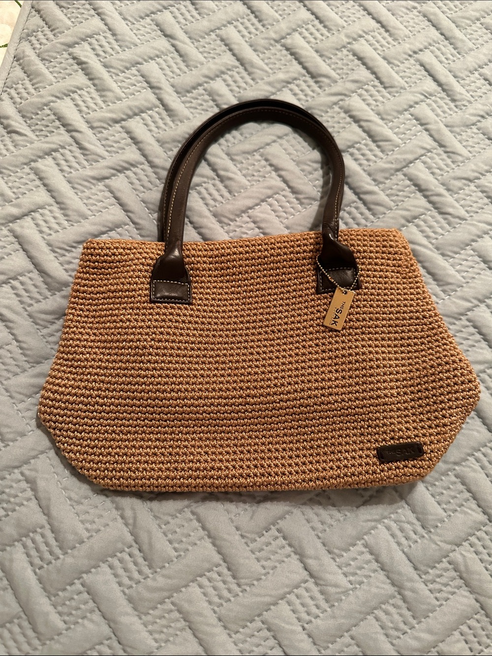The SAK  ADORABLE Purse with Brown leather Handles